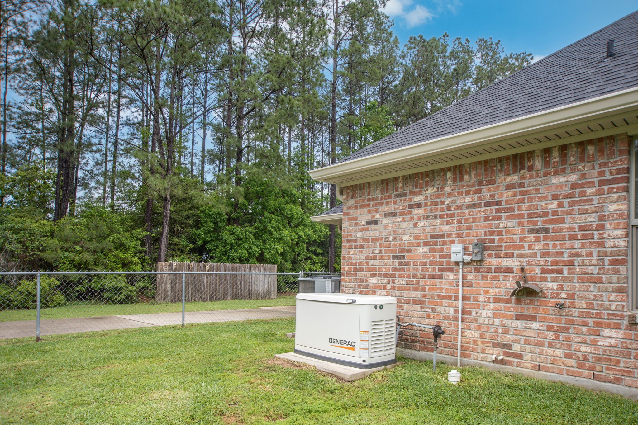 4145 Fm 770 Road Kountze, TX 77625 - Photo 10 of 38 a backyard of a house with table and chairs