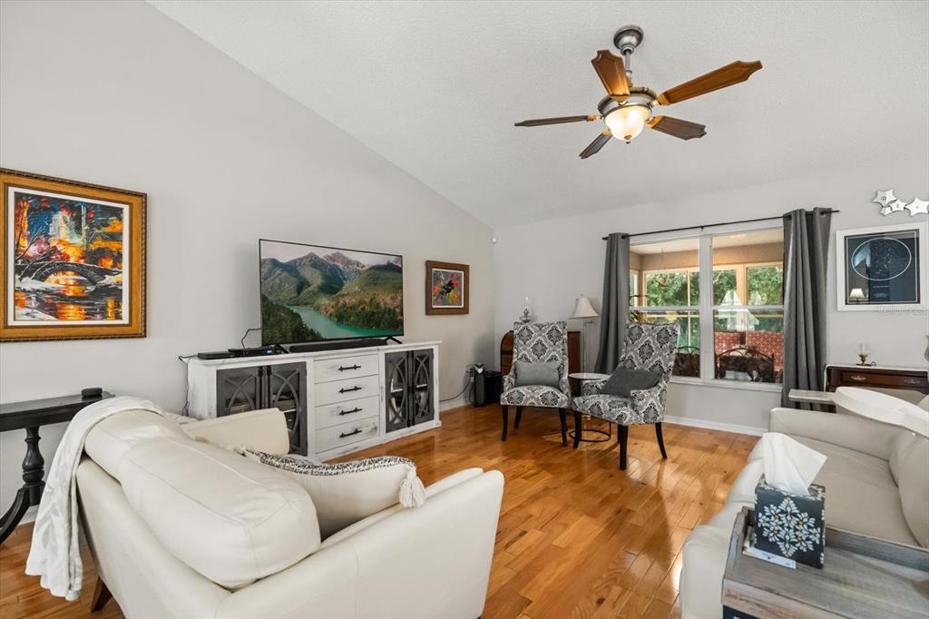 1336 Star Court Deltona, FL 32725 - Photo 14 of 34 a living room with furniture and a flat screen tv