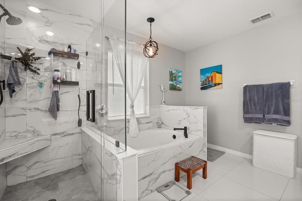 1336 Star Court Deltona, FL 32725 - Photo 20 of 34 a bathroom with a sink a toilet and a shower