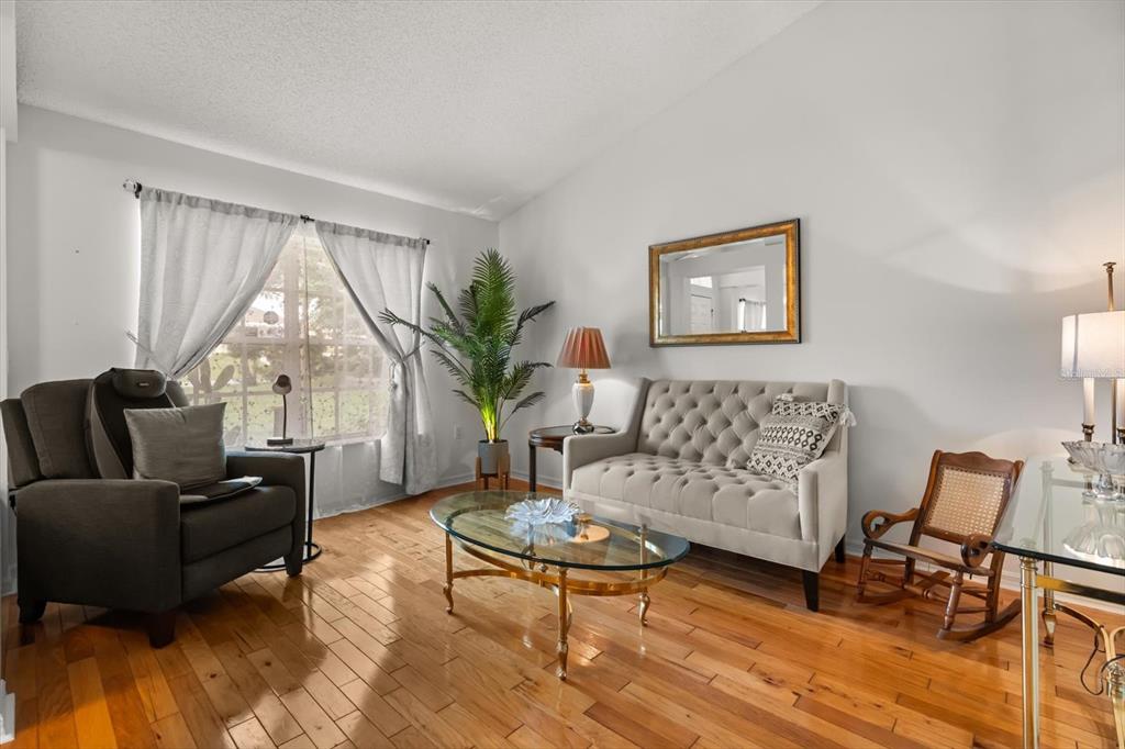 1336 Star Court Deltona, FL 32725 - Photo 9 of 34 a living room with furniture and a large window