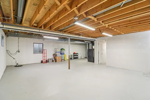 a view of empty room with closet