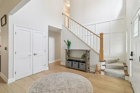 a living room with furniture and a table