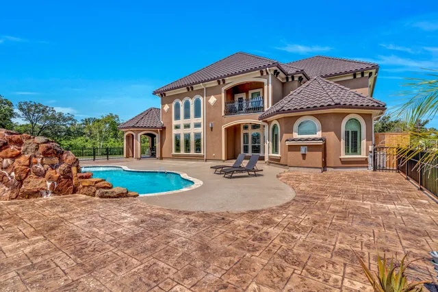 a front view of a house with entertaining space