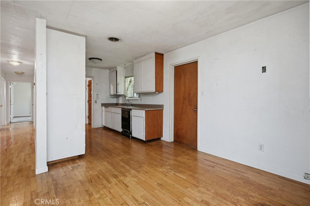 15050 Lakeview Way Clearlake, CA 95422 - Photo 11 of 24 a view of kitchen with wooden floor