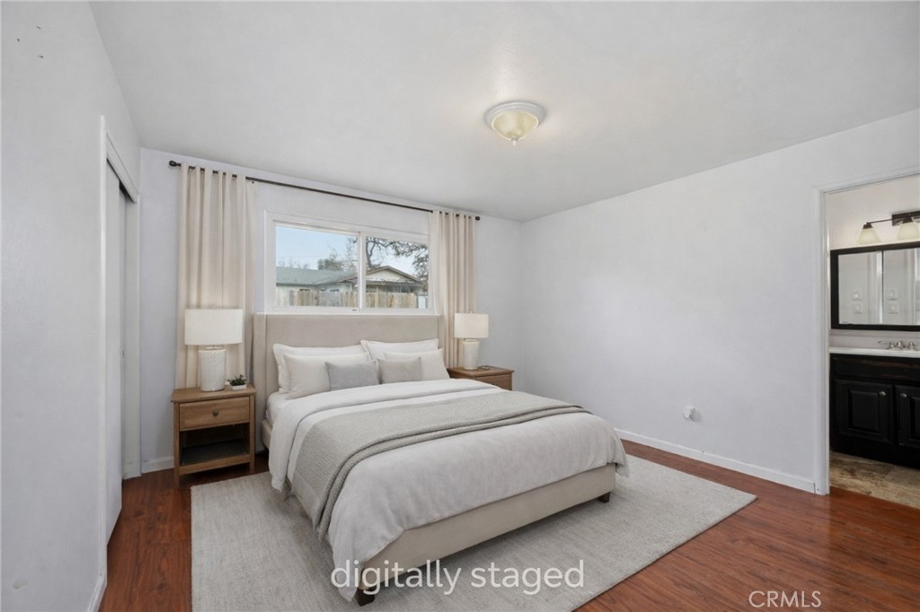 15050 Lakeview Way Clearlake, CA 95422 - Photo 15 of 24 a bedroom with a bed and a night stand