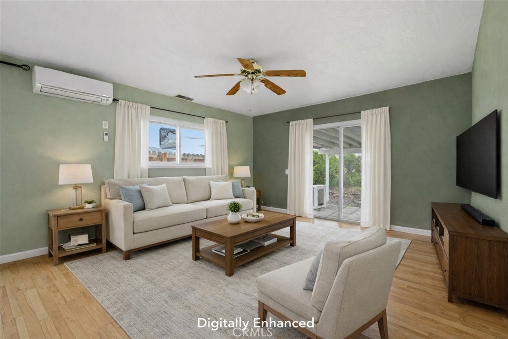 15050 Lakeview Way Clearlake, CA 95422 - Photo 7 of 24 a living room with furniture and a flat screen tv