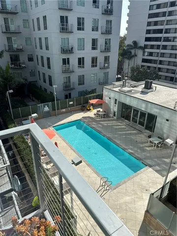 a view of building with swimming pool