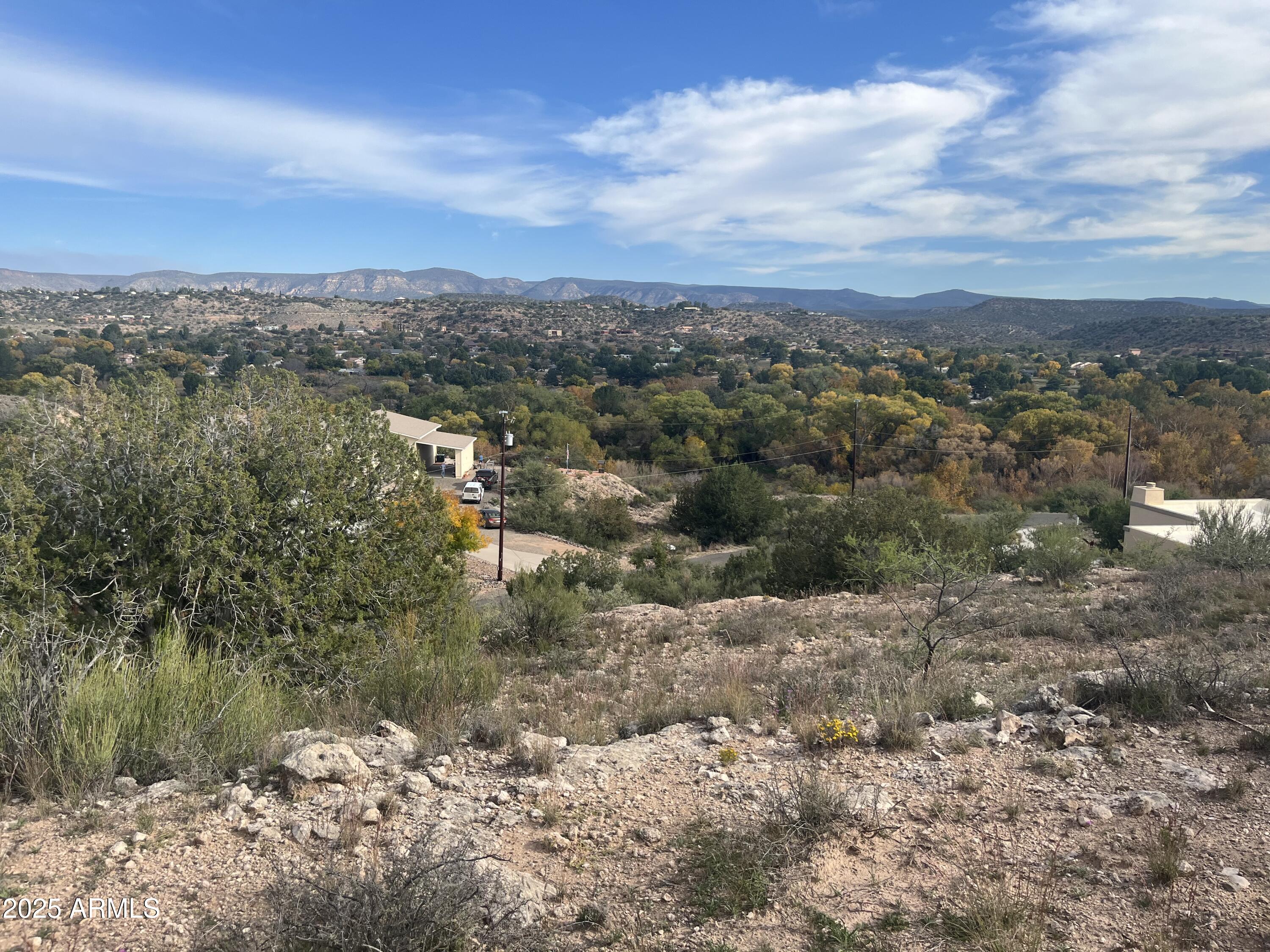 4585 Eagle Circle, Unit 166&167 Rimrock, AZ 86335 - Photo 25 of 28 a view of a lake with mountains in the background