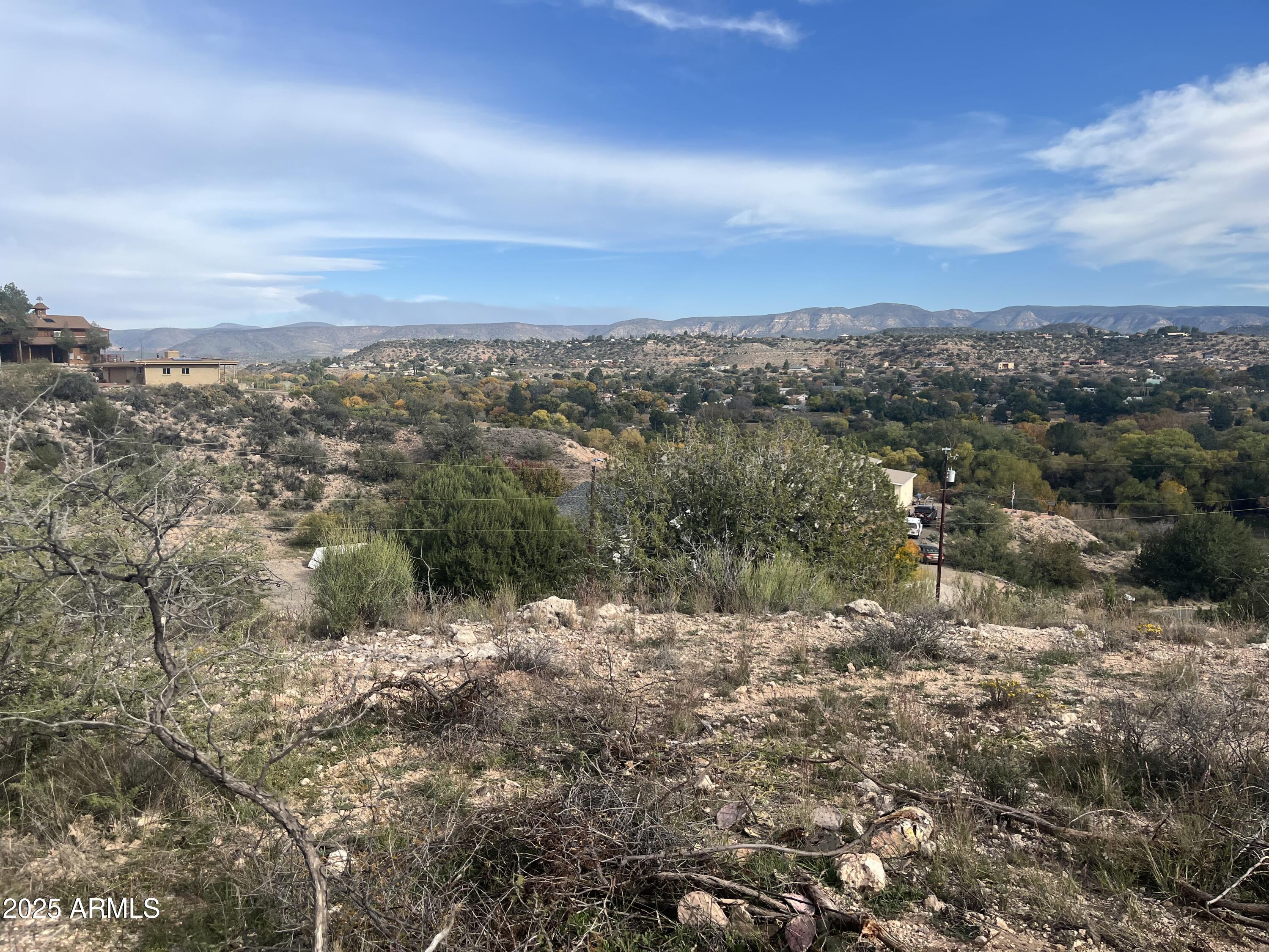 4585 Eagle Circle, Unit 166&167 Rimrock, AZ 86335 - Photo 26 of 28 a view of a lake with mountains in the background