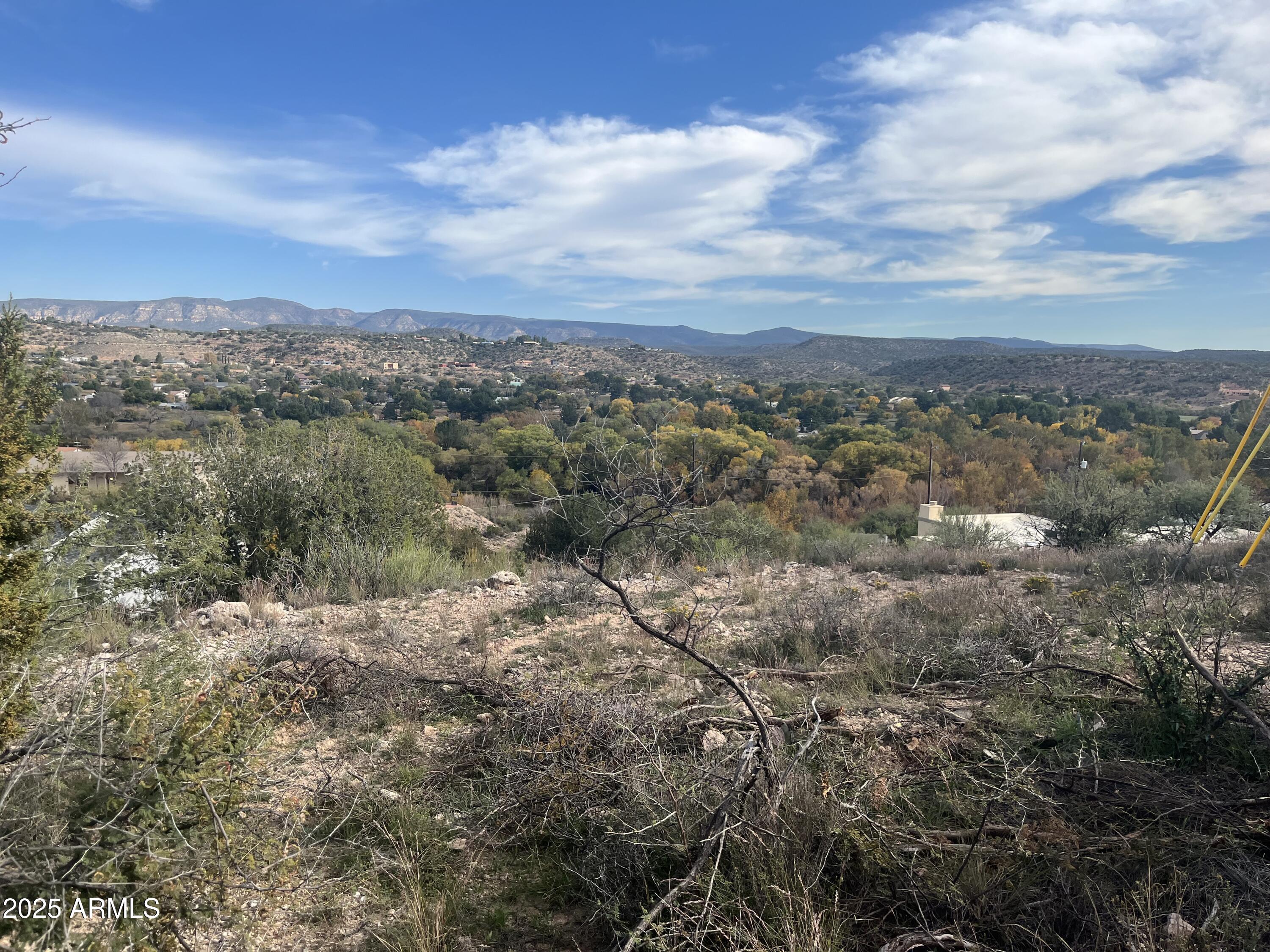 4585 Eagle Circle, Unit 166&167 Rimrock, AZ 86335 - Photo 27 of 28 a view of a lake with mountains in the background