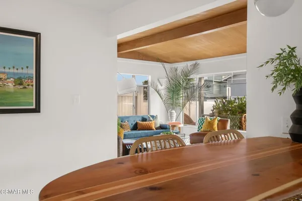 a room with table and chairs