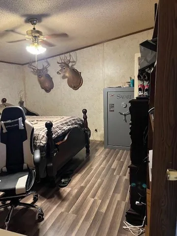 a bedroom with a bed and cabinets