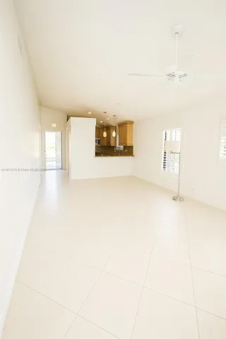 a view of a utility room with windows