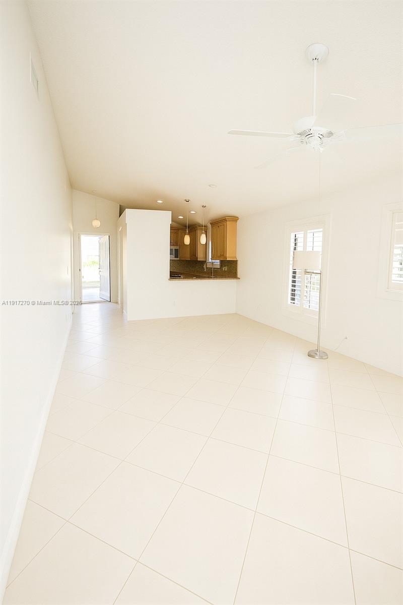 8190 Springtree Road, Unit 8190 Boca Raton, FL 33496 - Photo 6 of 23 a view of a utility room with windows