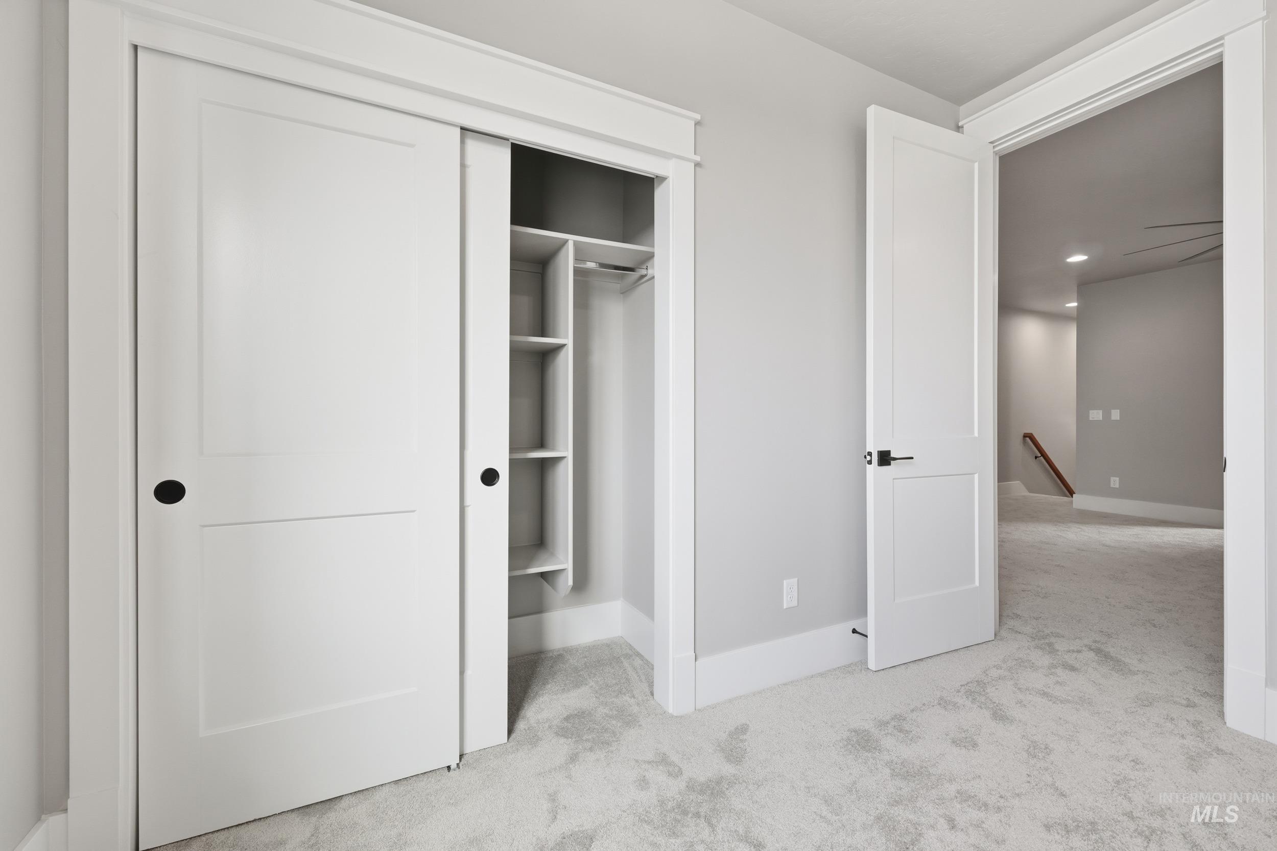 1035 East Crescendo Street Meridian, ID 83642 - Photo 37 of 50 Unfurnished bedroom featuring a closet and light colored carpet