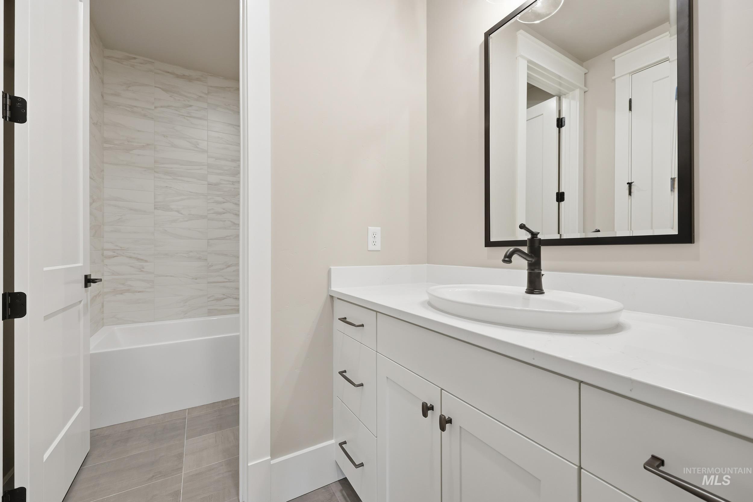 1035 East Crescendo Street Meridian, ID 83642 - Photo 38 of 50 Full bath with vanity and baseboards