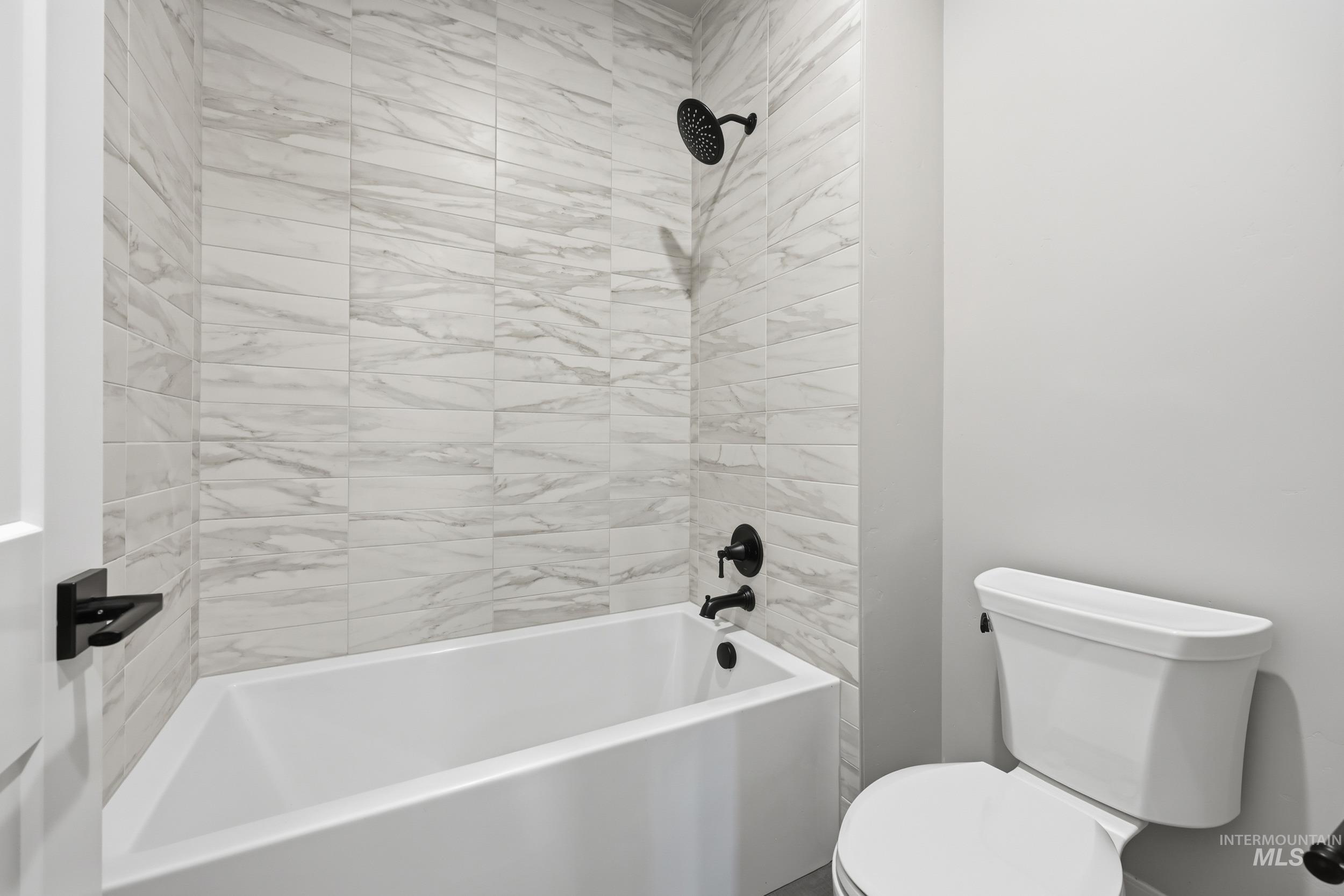 1035 East Crescendo Street Meridian, ID 83642 - Photo 39 of 50 Bathroom with shower / bathtub combination and toilet