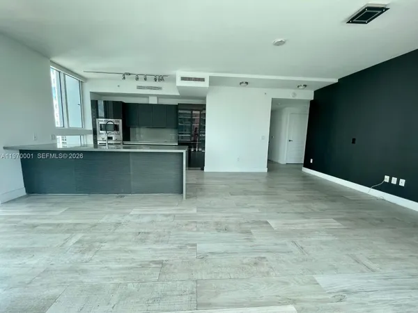 a bathroom with a glass door