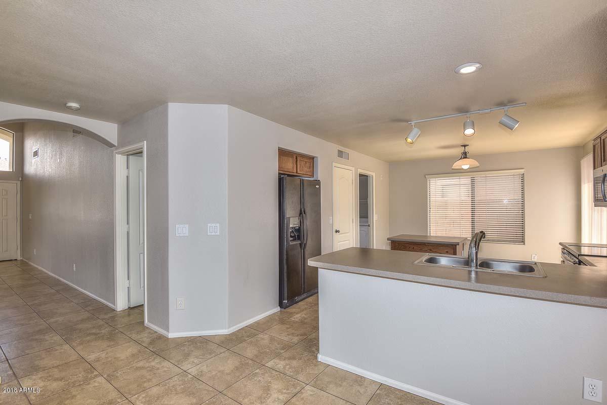 5023 West Ardmore Road Laveen, AZ 85339 - Photo 7 of 31 Family Room-Kitchen