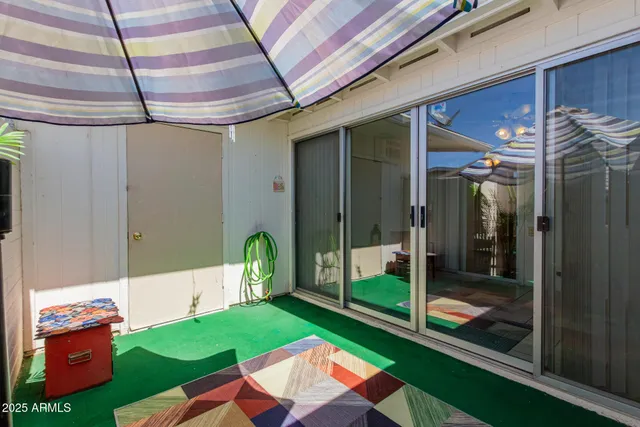 a backyard of a house with seating space