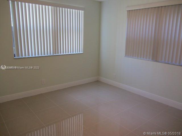 Doral Doral, FL 33166 - Photo 18 of 26 an empty room with a window
