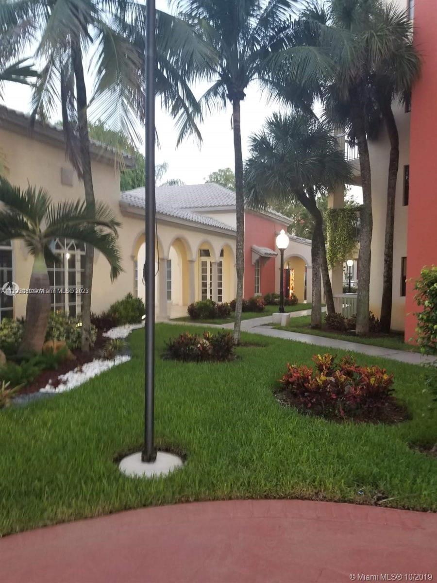 Doral Doral, FL 33166 - Photo 4 of 26 a front view of a house with garden