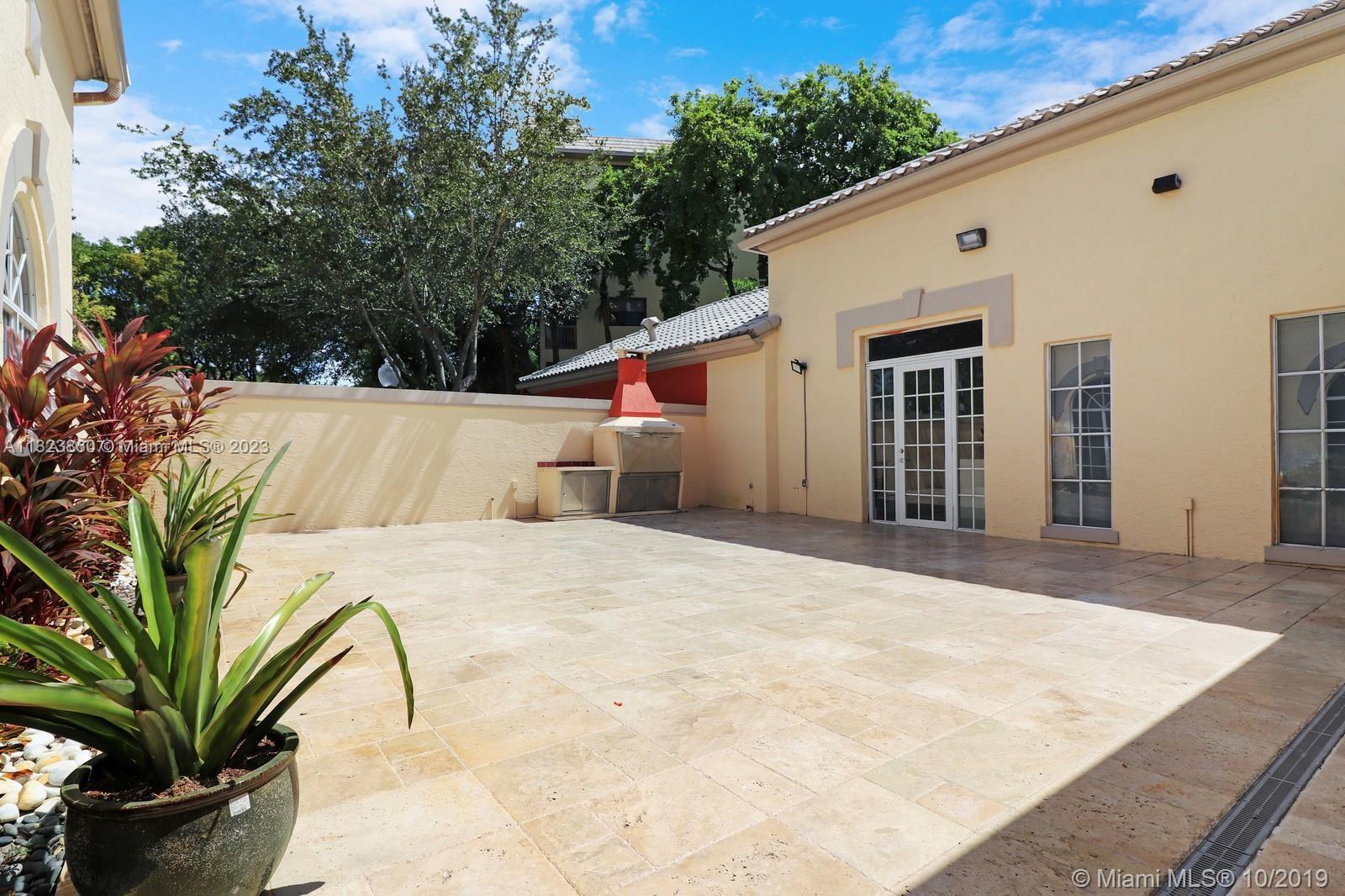 Doral Doral, FL 33166 - Photo 7 of 26 a view of a house with a backyard