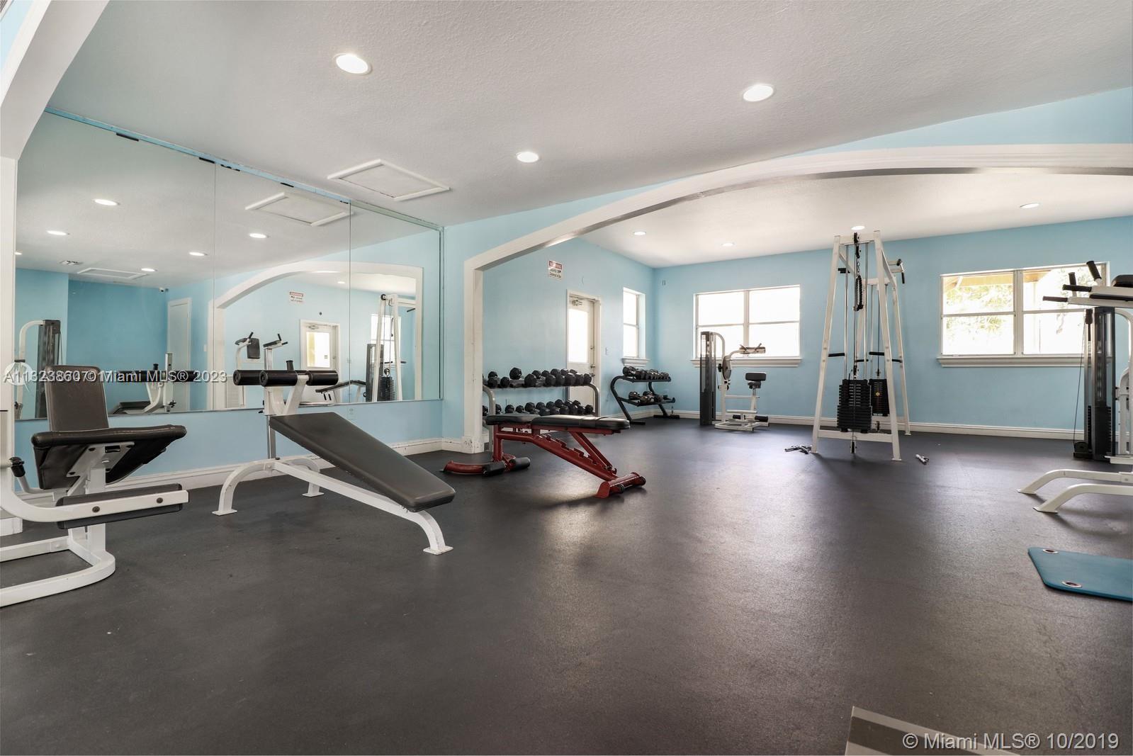 Doral Doral, FL 33166 - Photo 10 of 26 a view of a living room filled with furniture and a chandelier