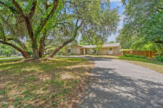 a house view with garden space