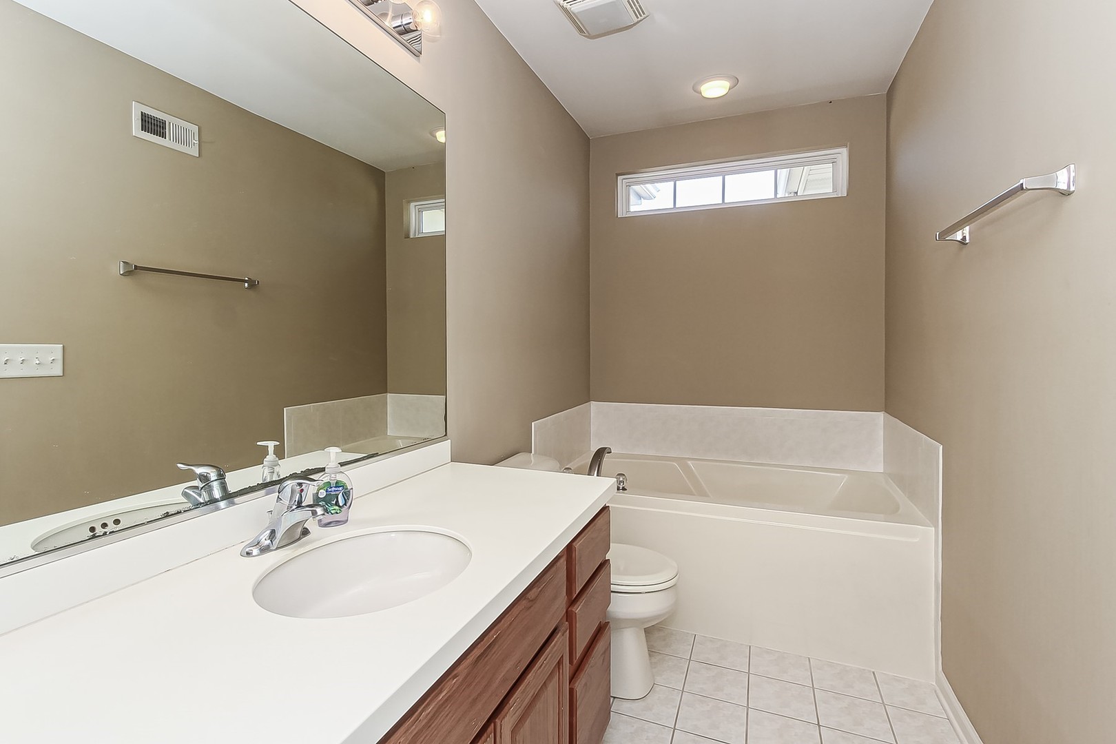 112 Durango Drive Gilberts, IL 60136 - Photo 15 of 24 a bathroom with a sink a toilet and shower