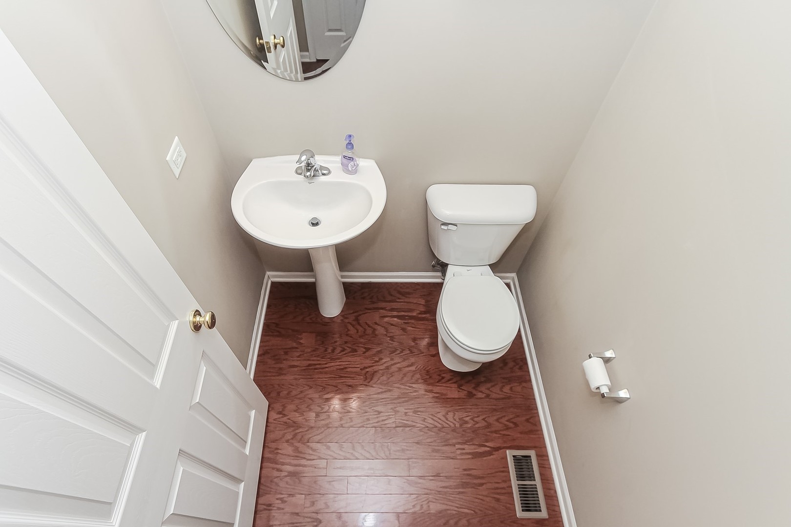 112 Durango Drive Gilberts, IL 60136 - Photo 20 of 24 a bathroom with a toilet sink and mirror