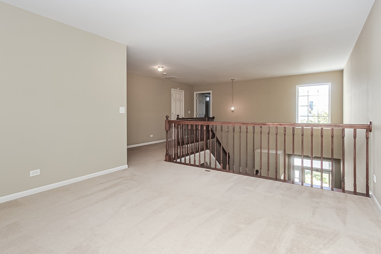 112 Durango Drive Gilberts, IL 60136 - Photo 21 of 24 a view of an empty room with stairs