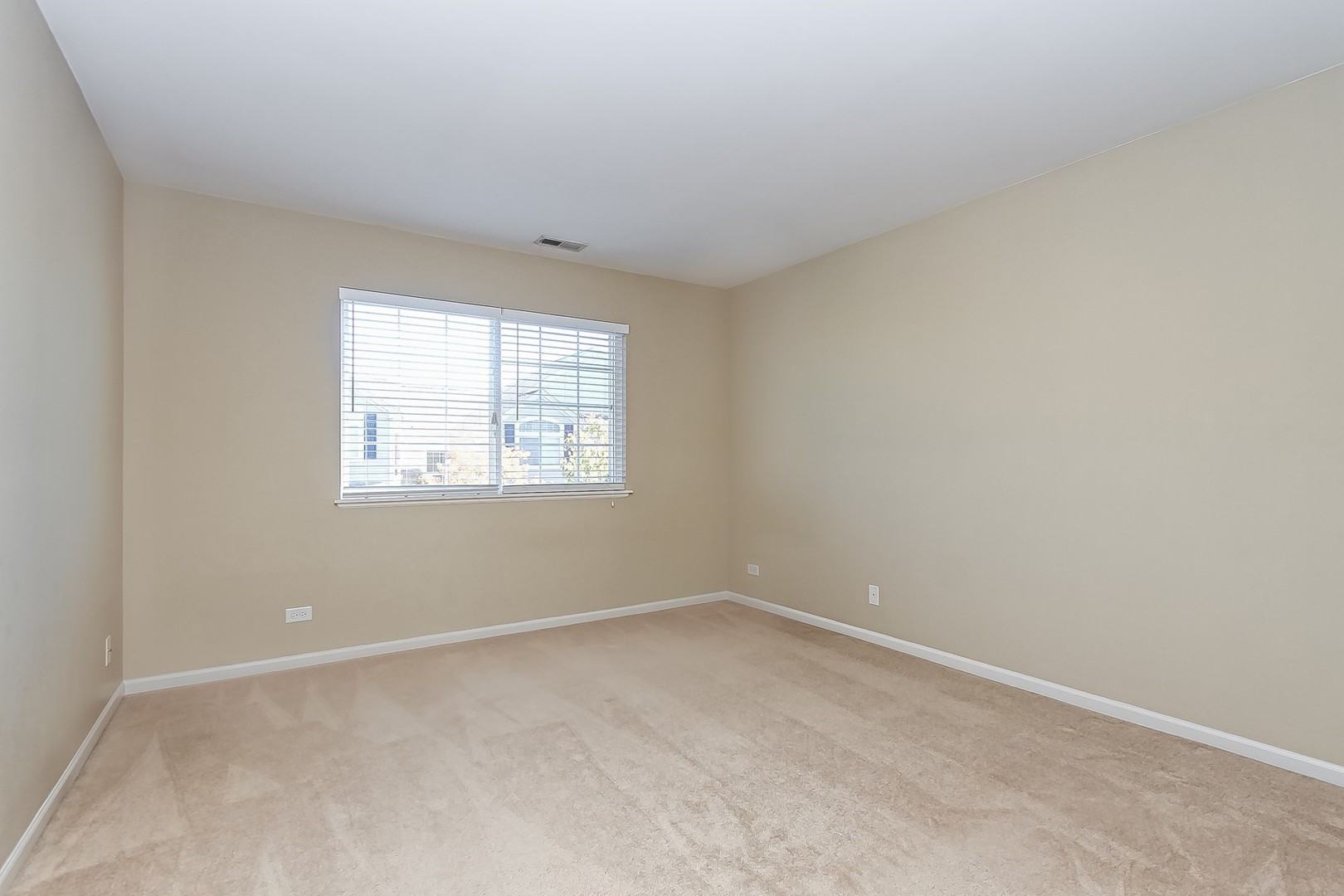 112 Durango Drive Gilberts, IL 60136 - Photo 22 of 24 an empty room with a window