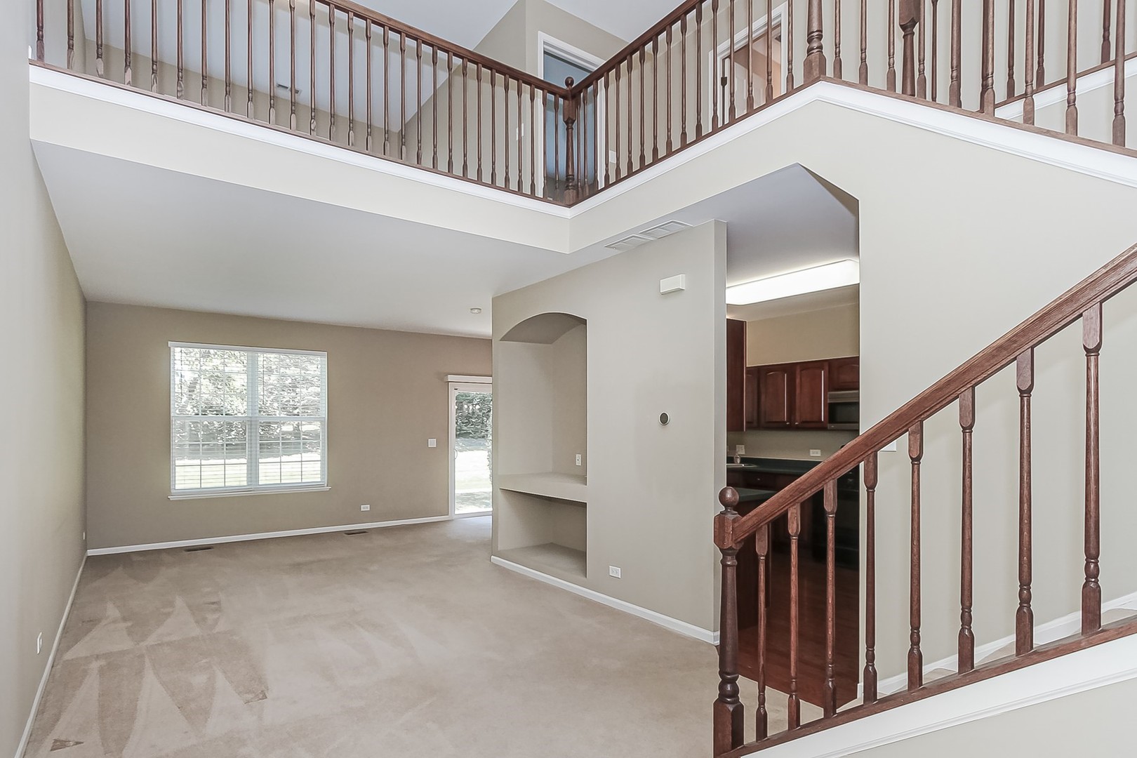 112 Durango Drive Gilberts, IL 60136 - Photo 3 of 24 a view of staircase with white walls and windows