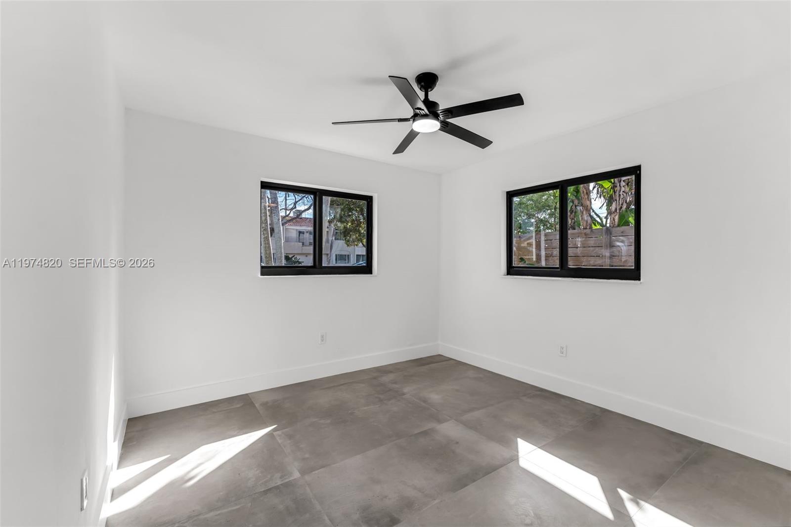 7120 Southwest 92nd Avenue Miami, FL 33173 - Photo 17 of 48 a view of a ceiling fan in a room