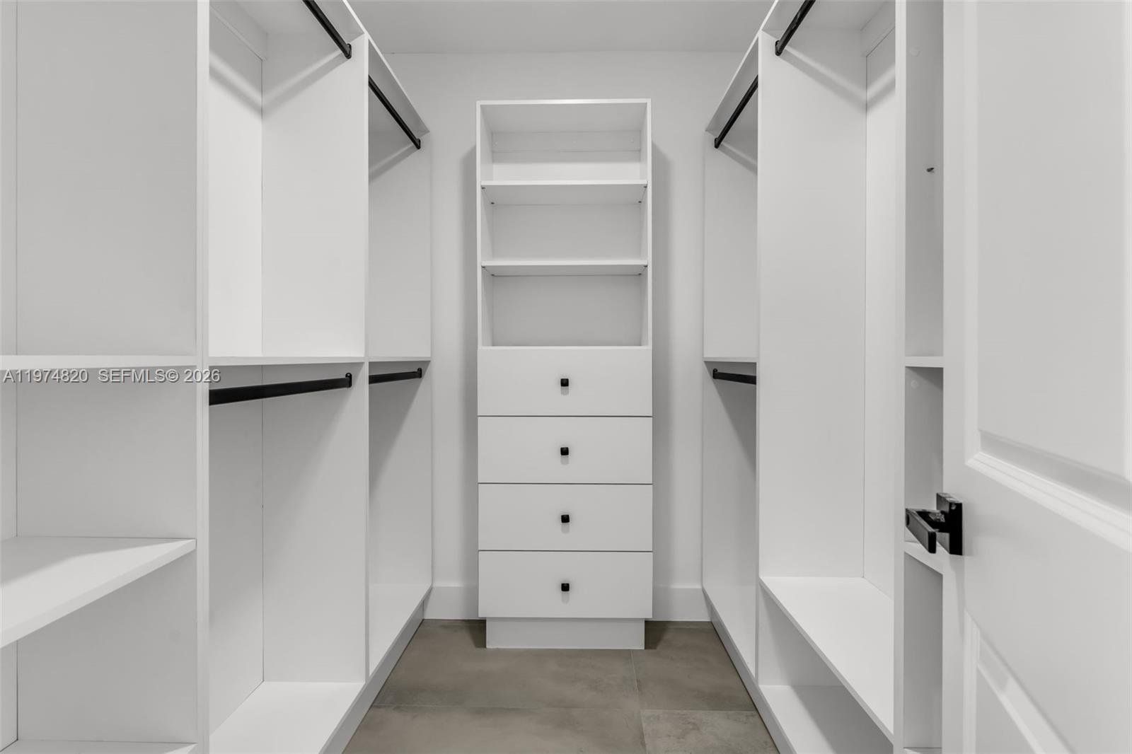 7120 Southwest 92nd Avenue Miami, FL 33173 - Photo 21 of 48 a view of an empty walk in closet