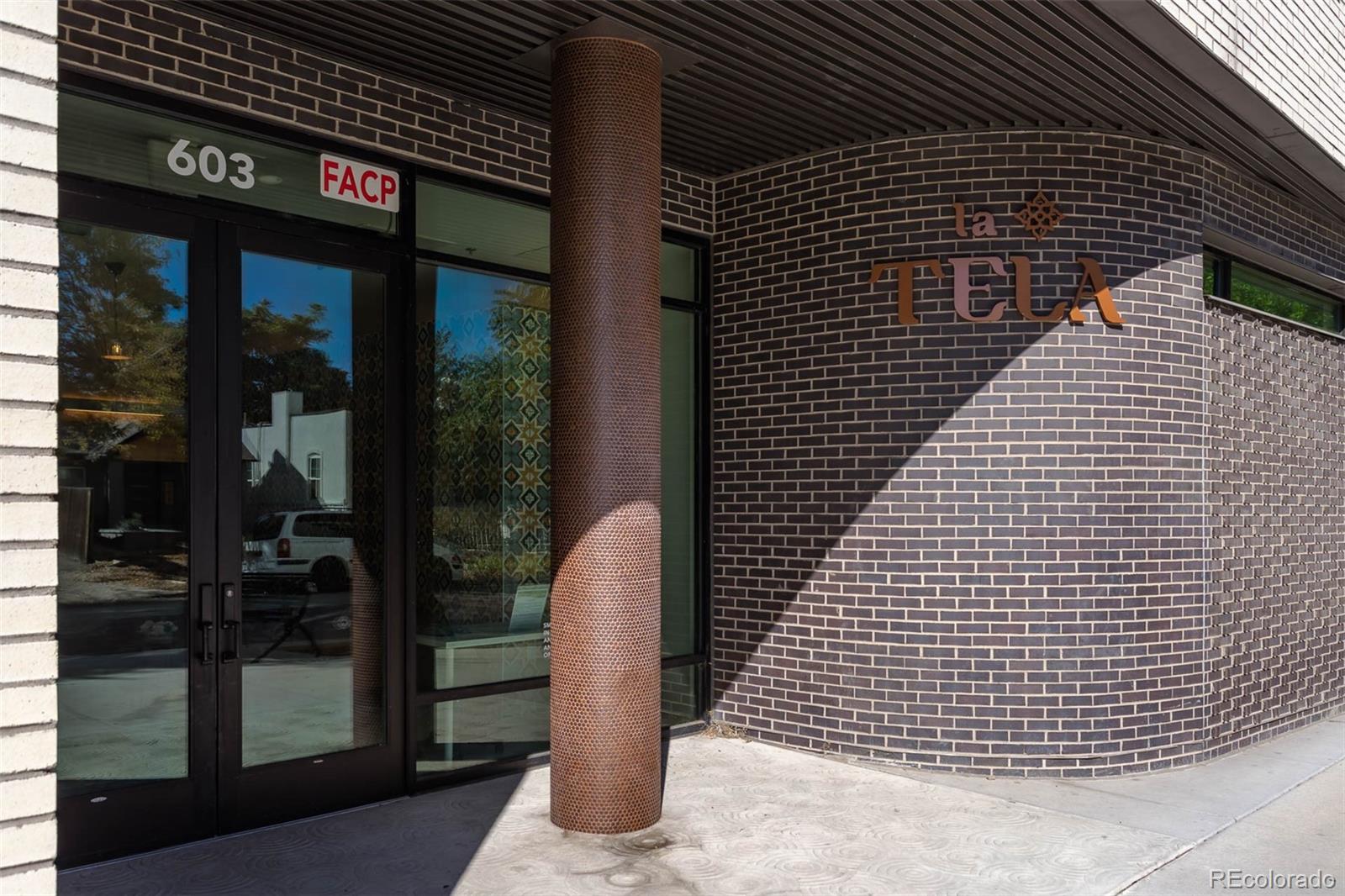 603 Inca Street, Unit 216 Denver, CO 80204 - Photo 4 of 22 a picture of a brick building