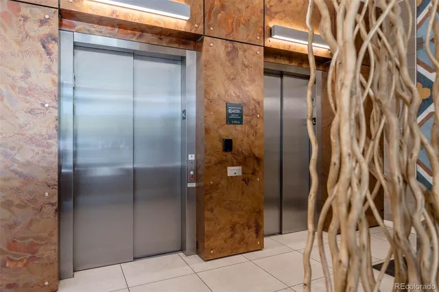 a bathroom with a glass door shower