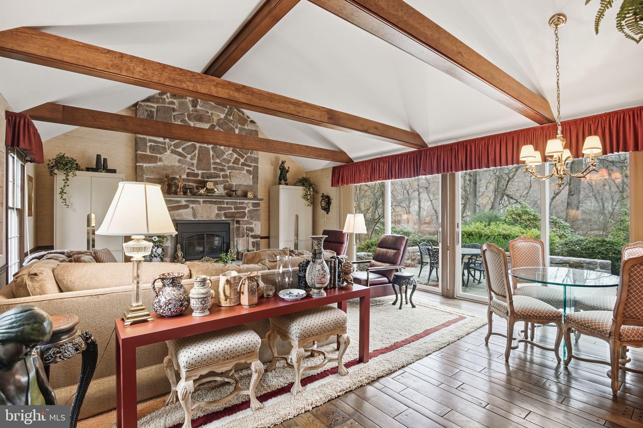 14 Devon Drive New Hope, PA 18938 - Photo 11 of 40 a living room with furniture large windows and wooden floor