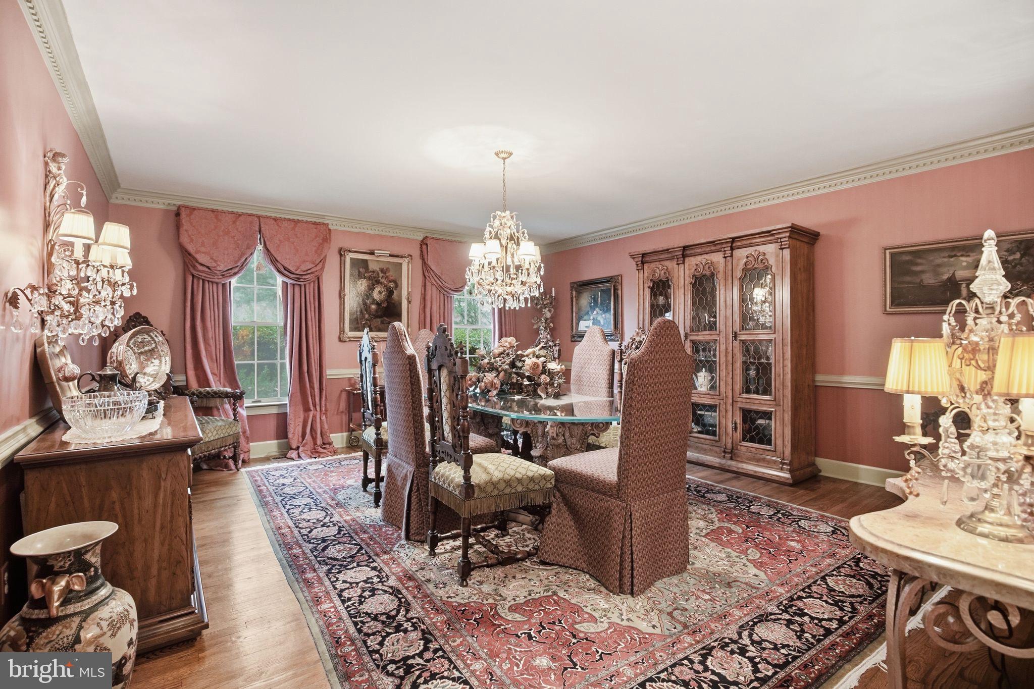 14 Devon Drive New Hope, PA 18938 - Photo 15 of 40 a living room with furniture chandelier and a rug