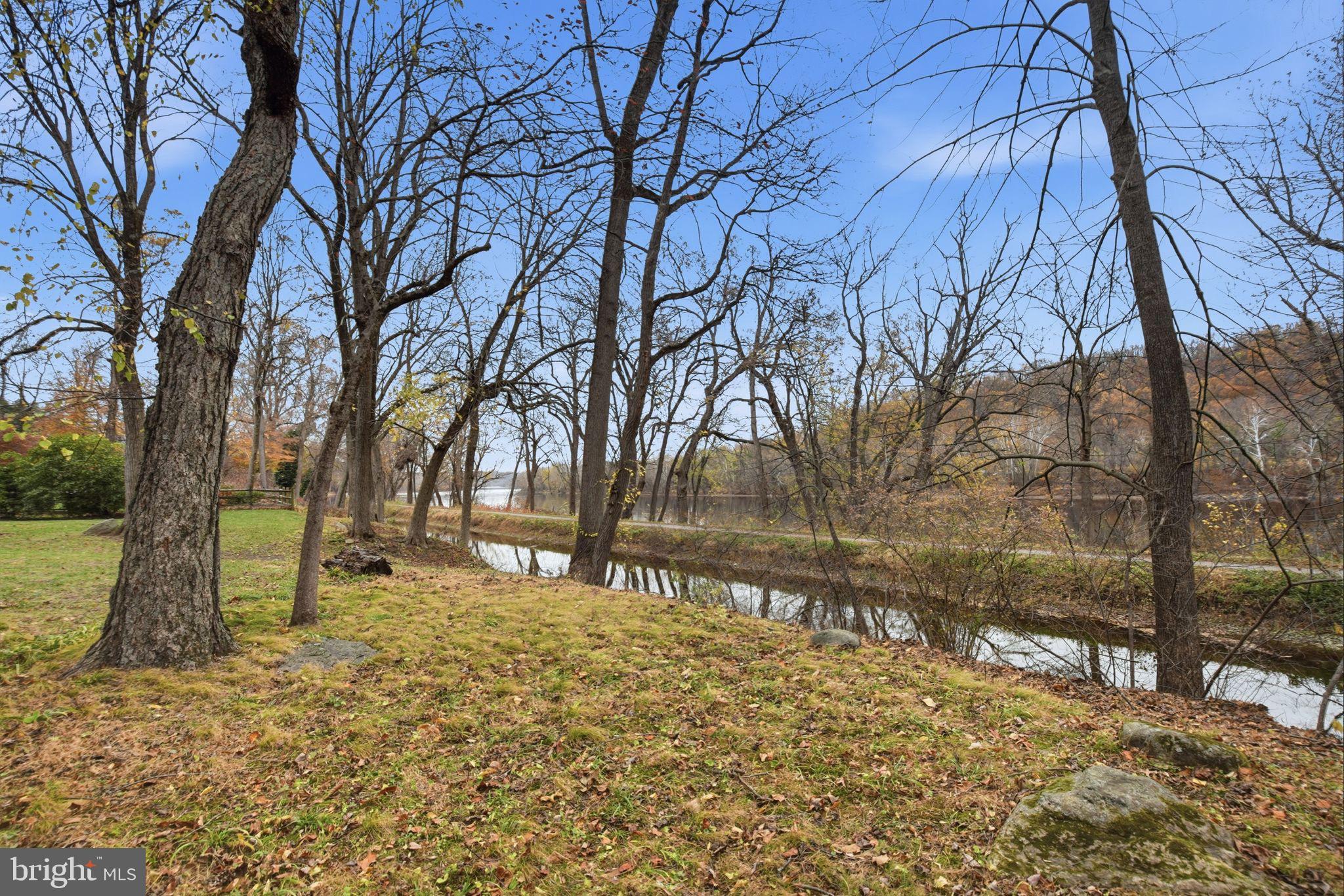 14 Devon Drive New Hope, PA 18938 - Photo 32 of 40 a backyard of a house with lots of green space