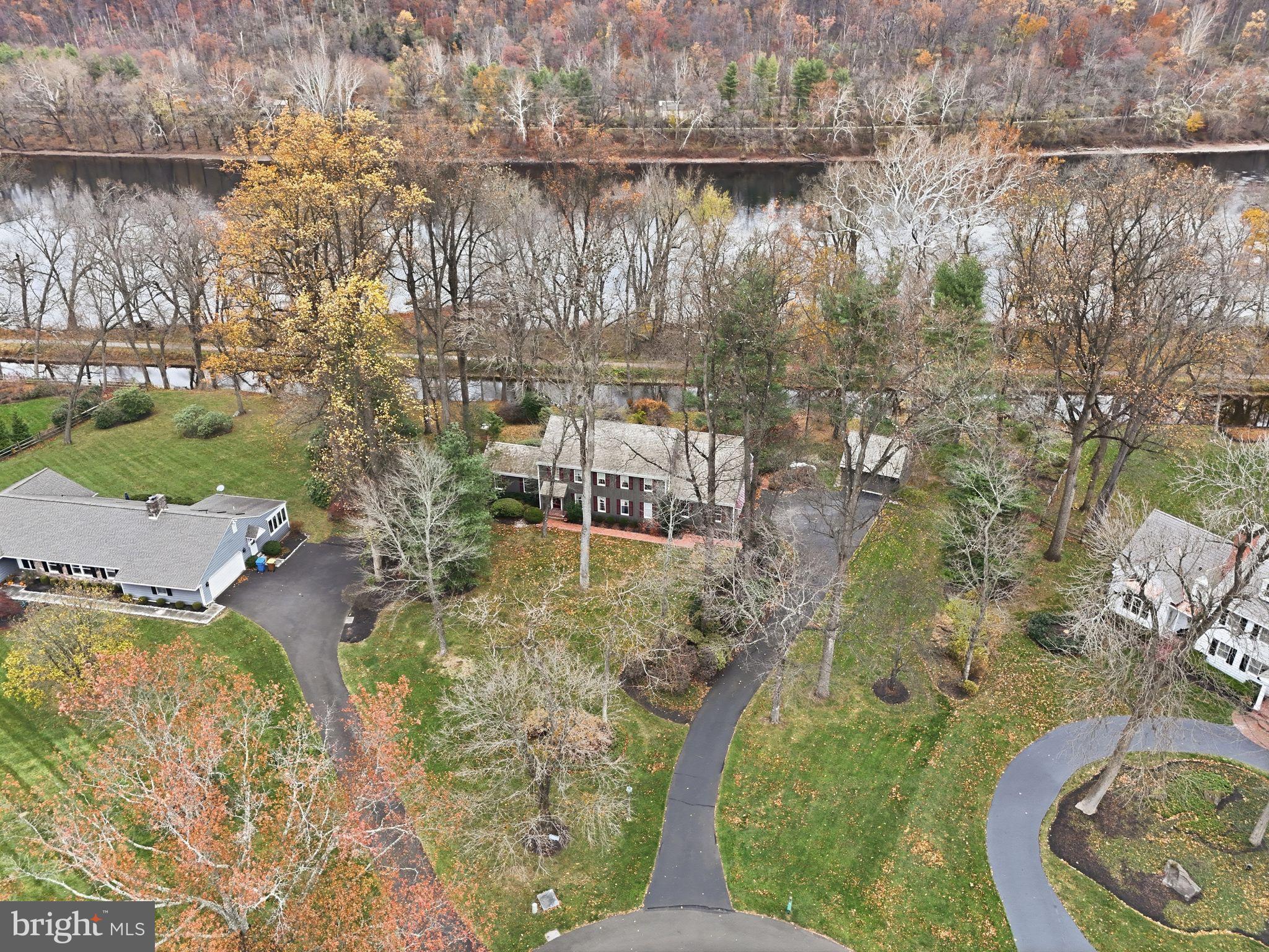 14 Devon Drive New Hope, PA 18938 - Photo 33 of 40 a aerial view of a house with a yard and lake view
