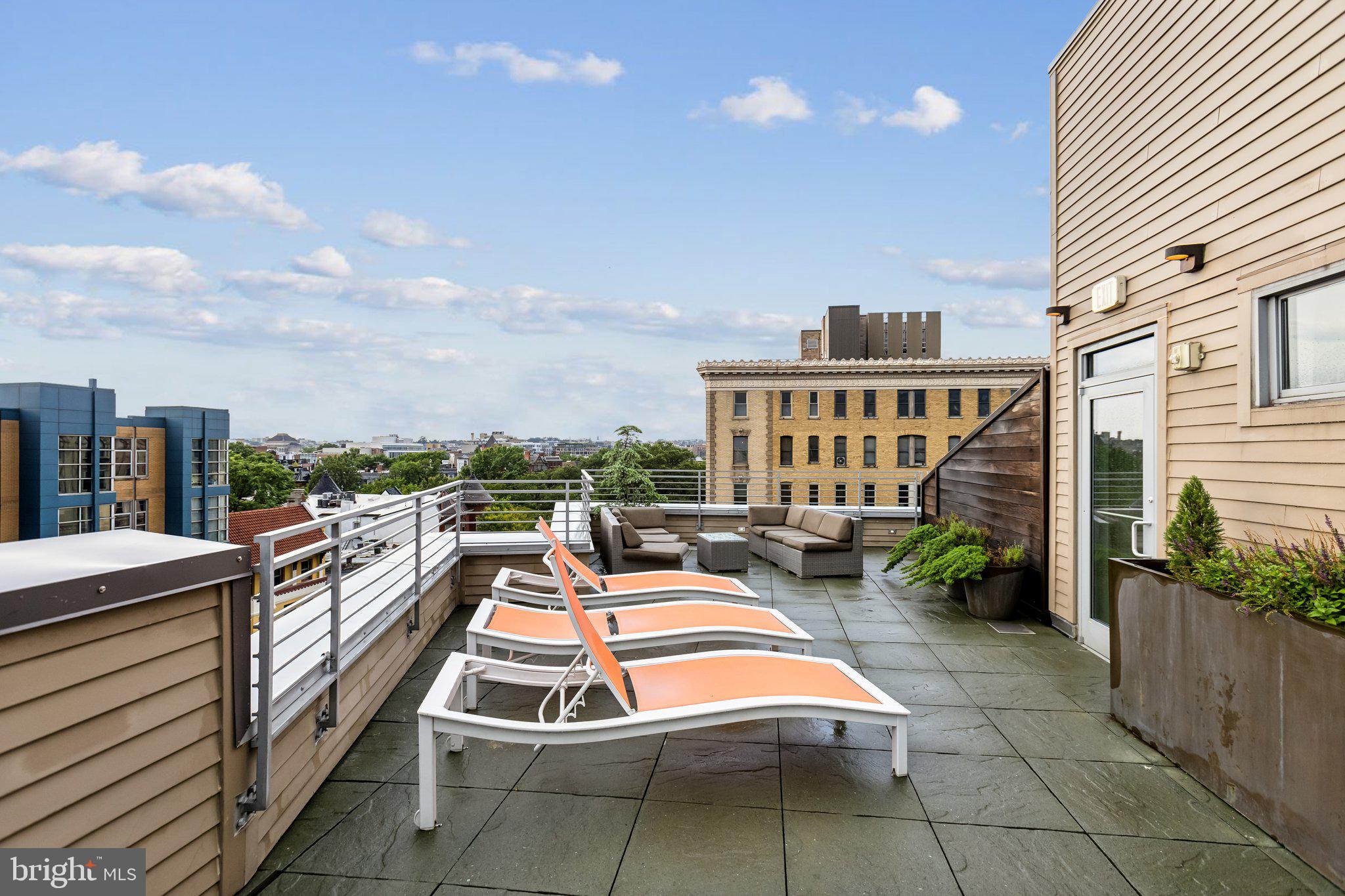 1311 13th Street Northwest, Unit T04 Washington, DC 20005 - Photo 17 of 18 a view of swimming pool with outdoor seating
