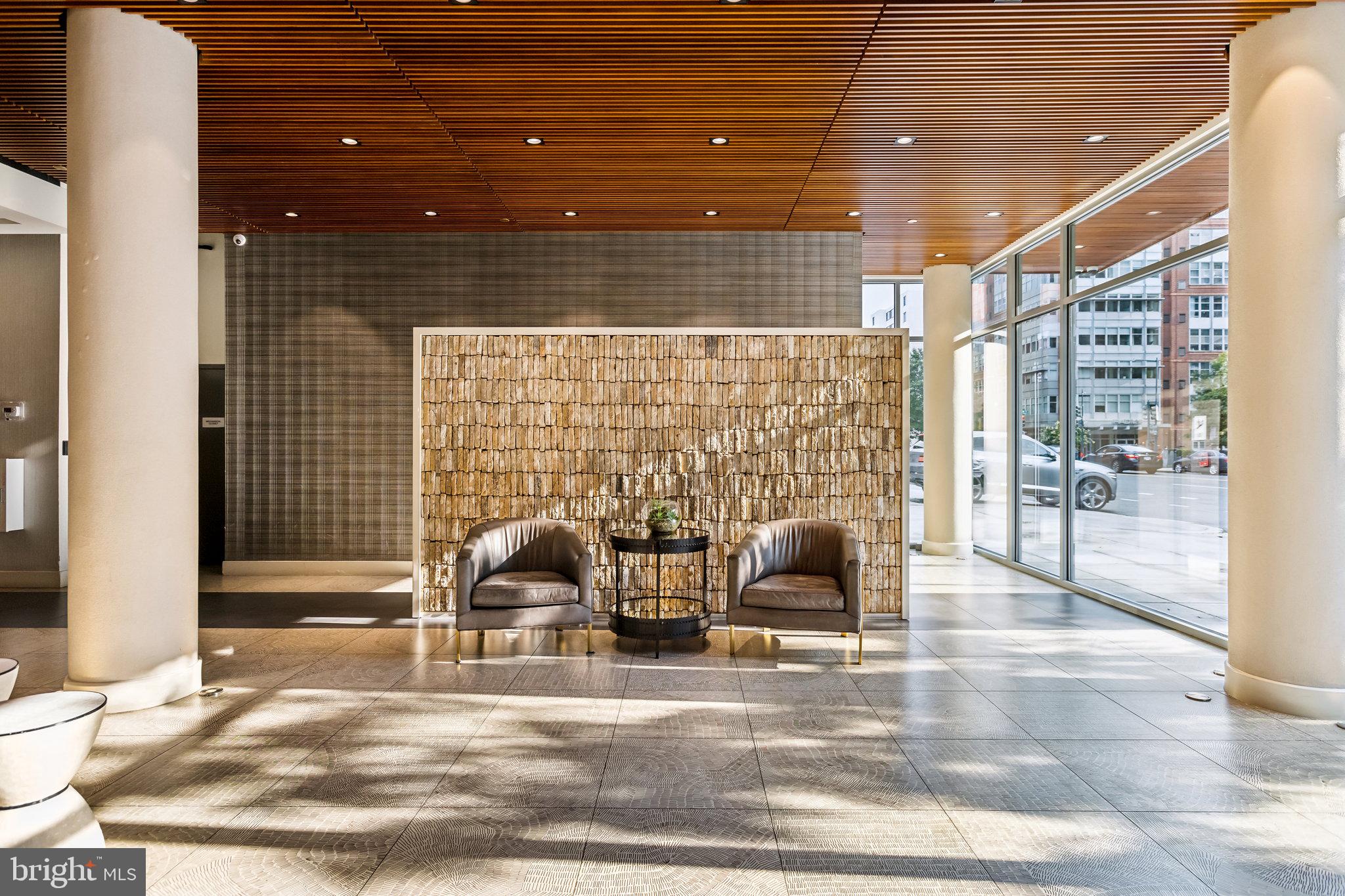 1311 13th Street Northwest, Unit T04 Washington, DC 20005 - Photo 3 of 18 a view of a patio with table and chairs