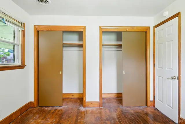 a view of entryway with wooden floor