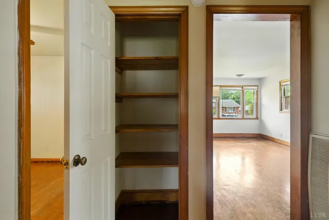 a view of a hallway with a closet