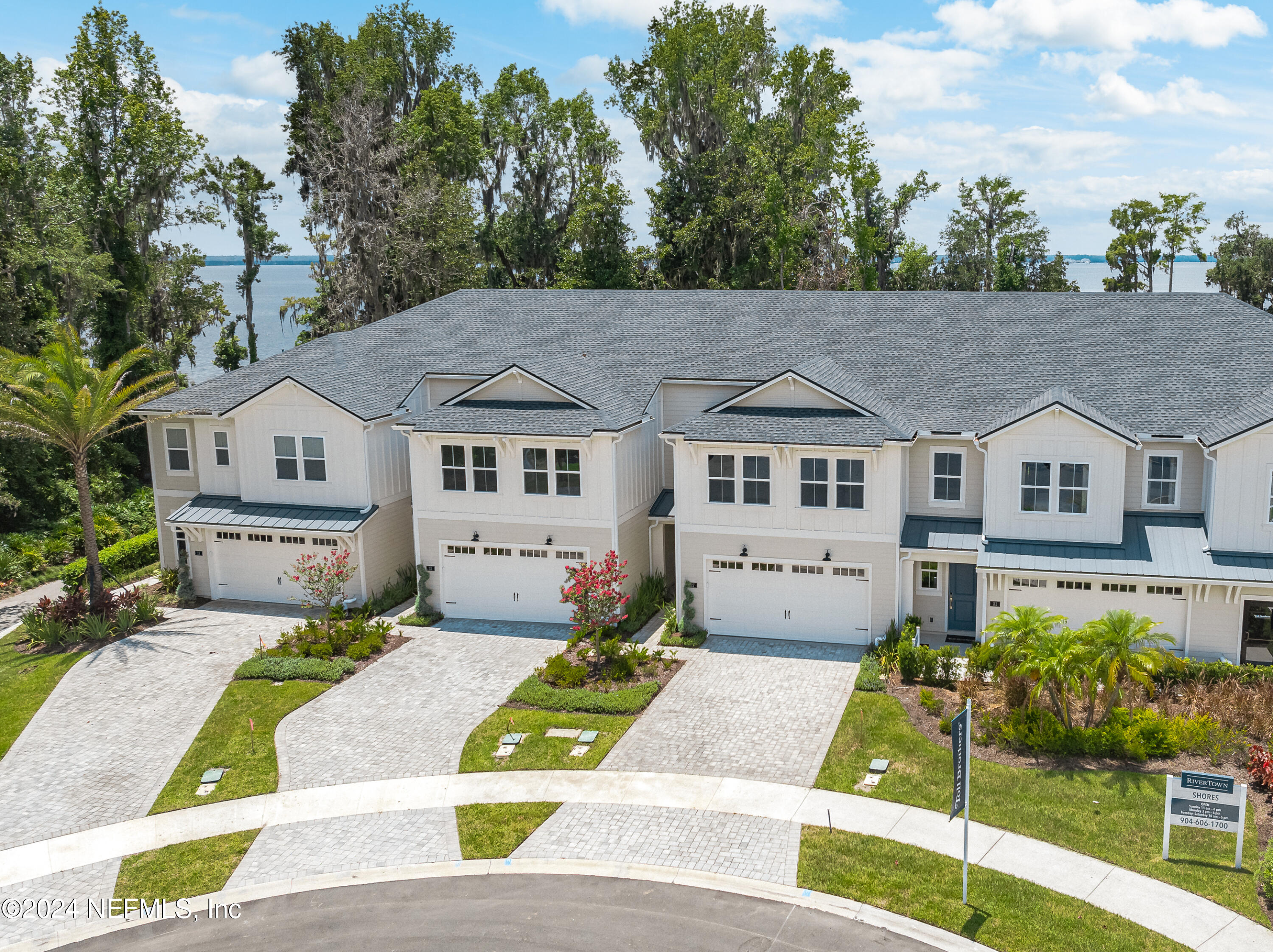 23 Oak Pk Drive St. Johns, FL 32259 - Photo 2 of 72 a front view of a house with a yard and garage