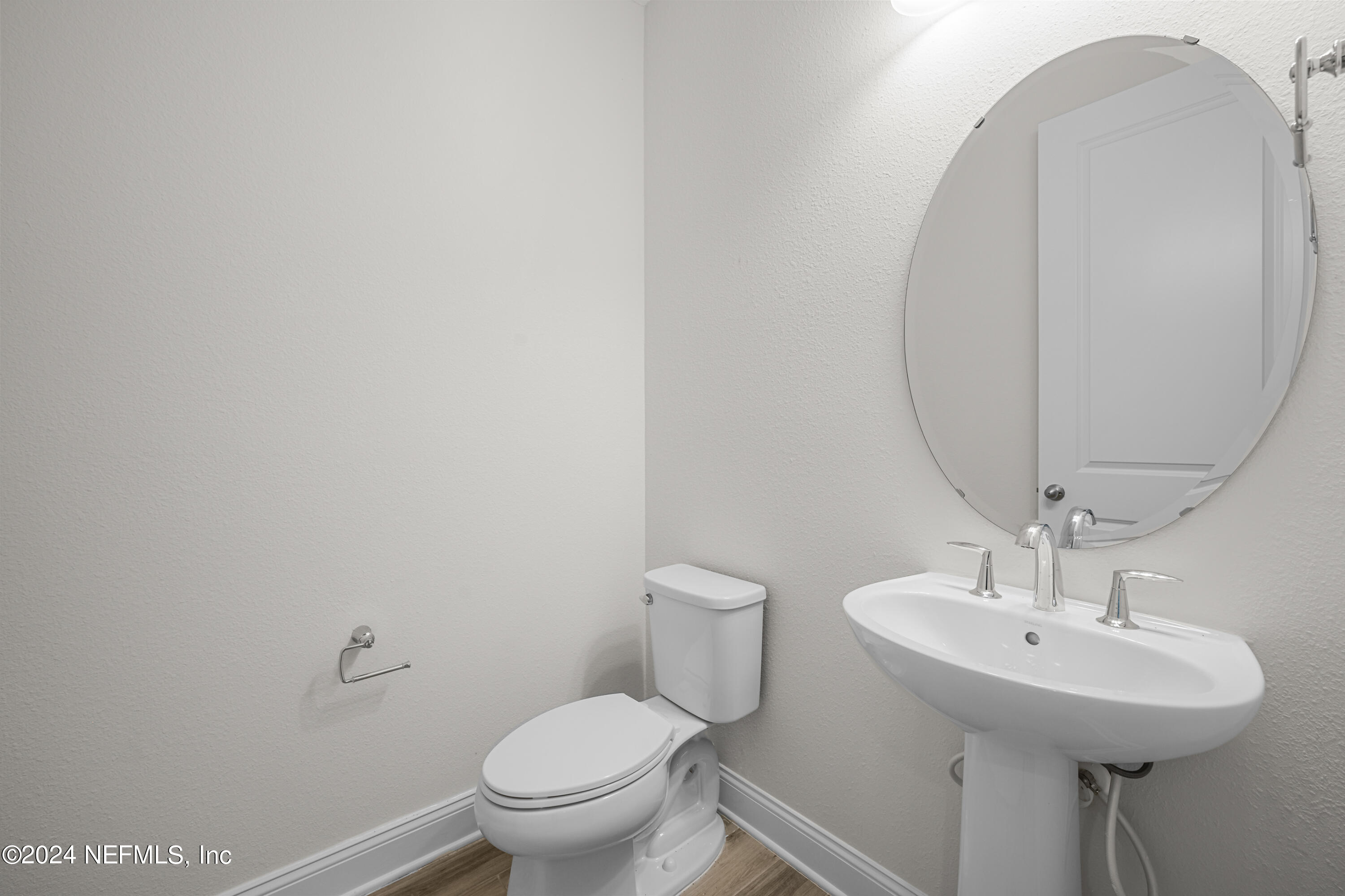 23 Oak Pk Drive St. Johns, FL 32259 - Photo 25 of 72 a bathroom with a sink toilet and a mirror