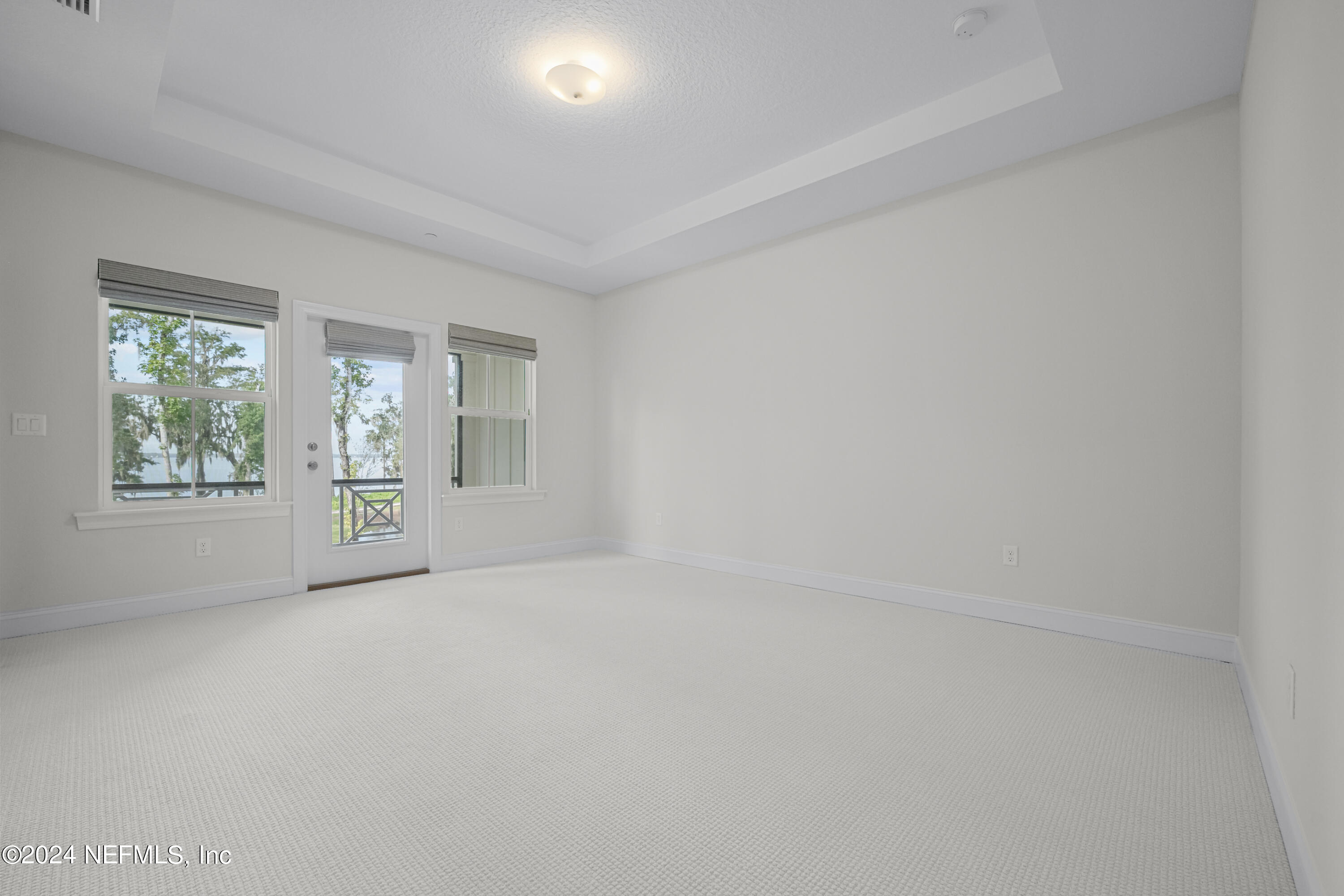 23 Oak Pk Drive St. Johns, FL 32259 - Photo 29 of 72 wooden floor in an empty room with a window