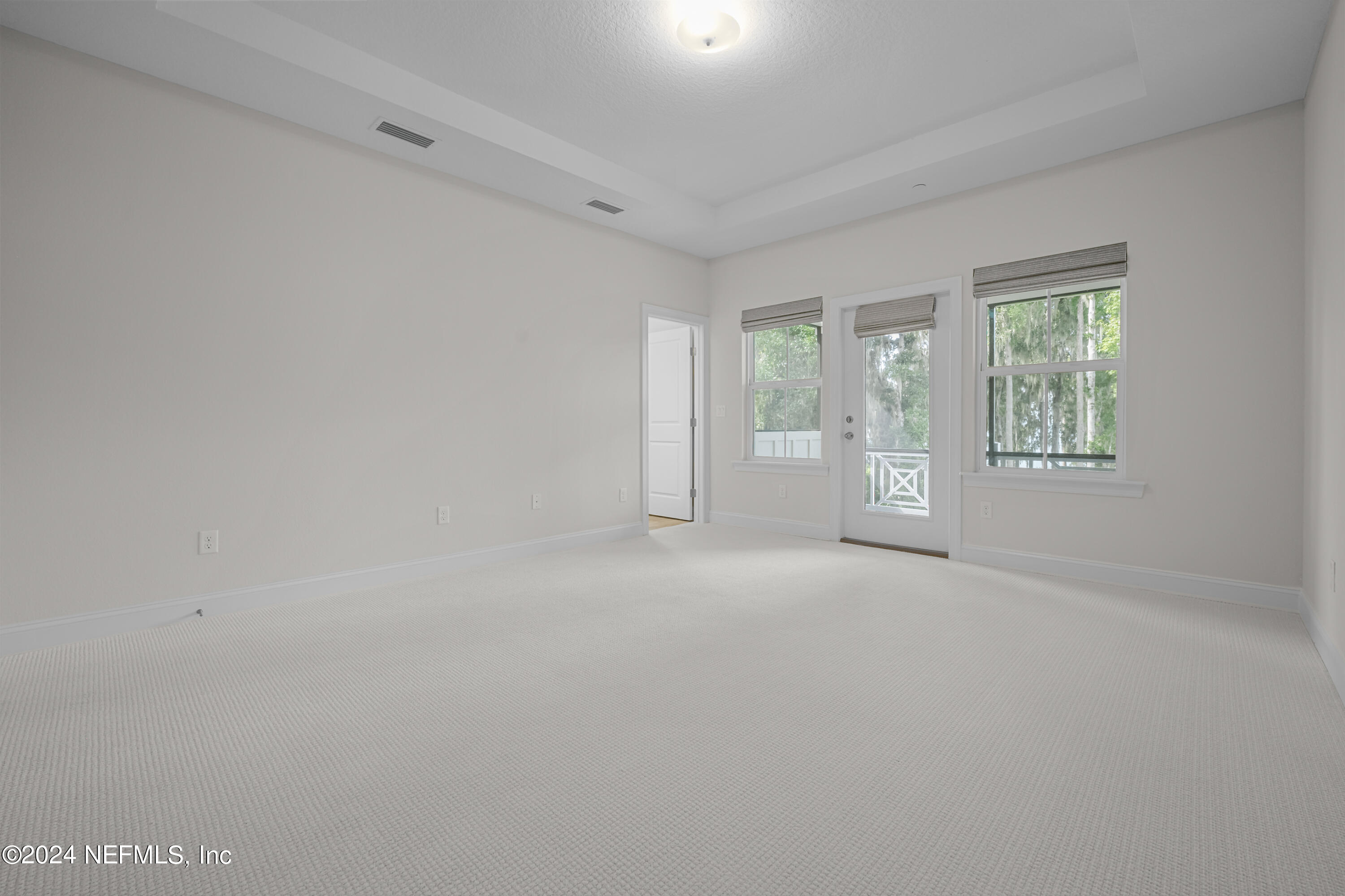 23 Oak Pk Drive St. Johns, FL 32259 - Photo 32 of 72 an empty room with windows